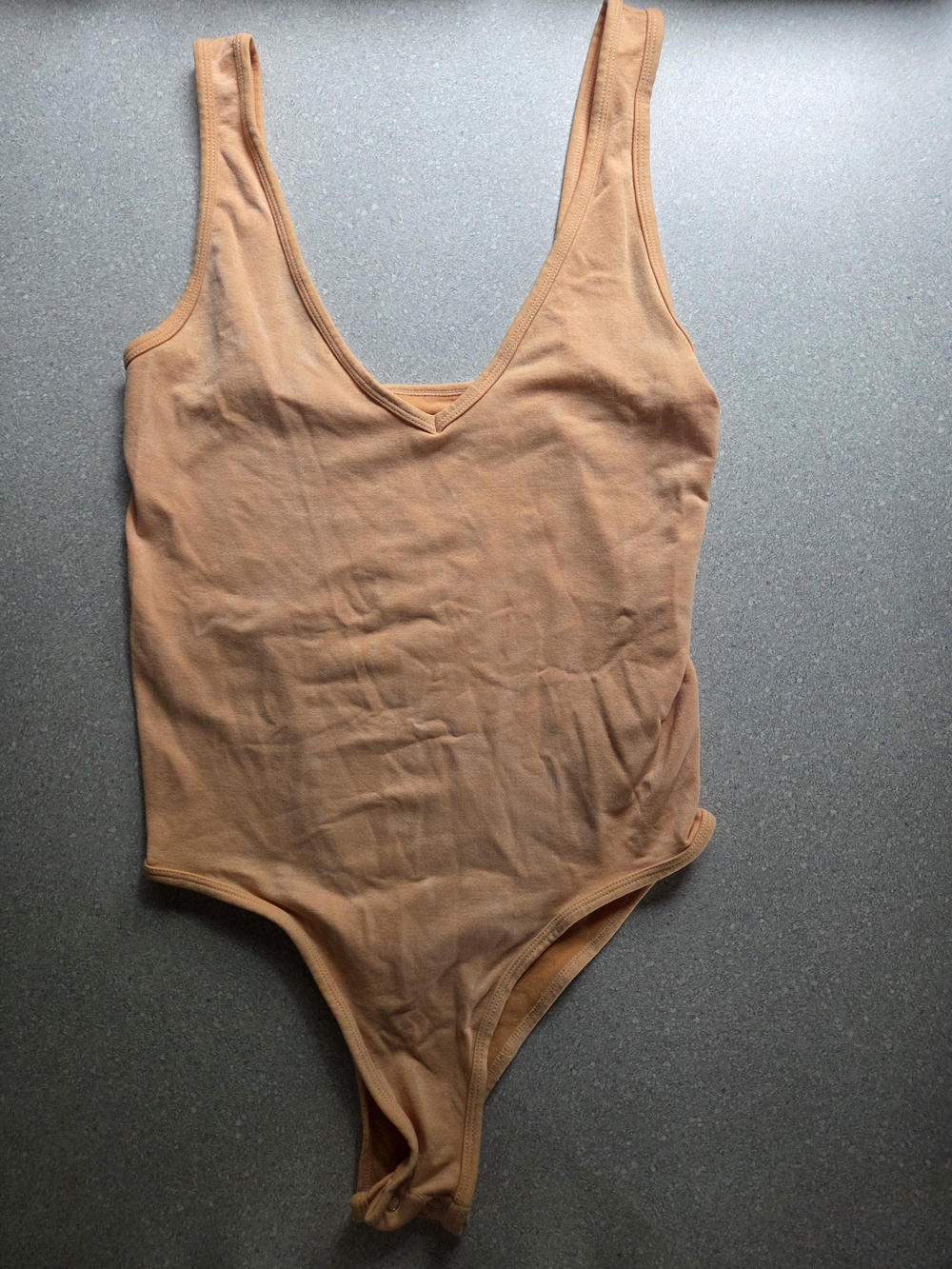 Sleeveless V-Neck Bodysuit in Warm Peach